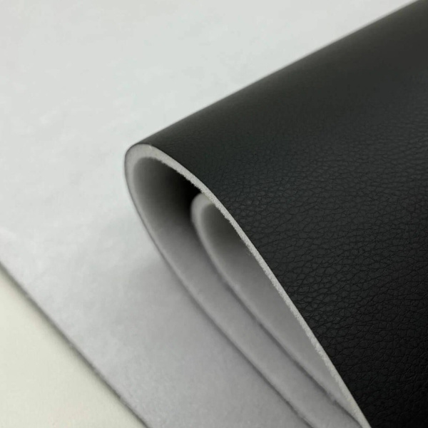 Винилискожа Орегон на поролоне 7мм на черном спандбонде 60г/кв.м. Черная толщина 7,6м, ширина 1,4м.