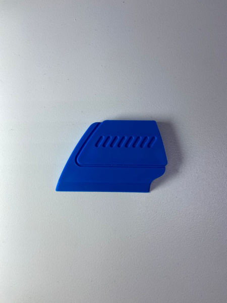 Скребок синий мини, мягкий 5,8*3,8 см